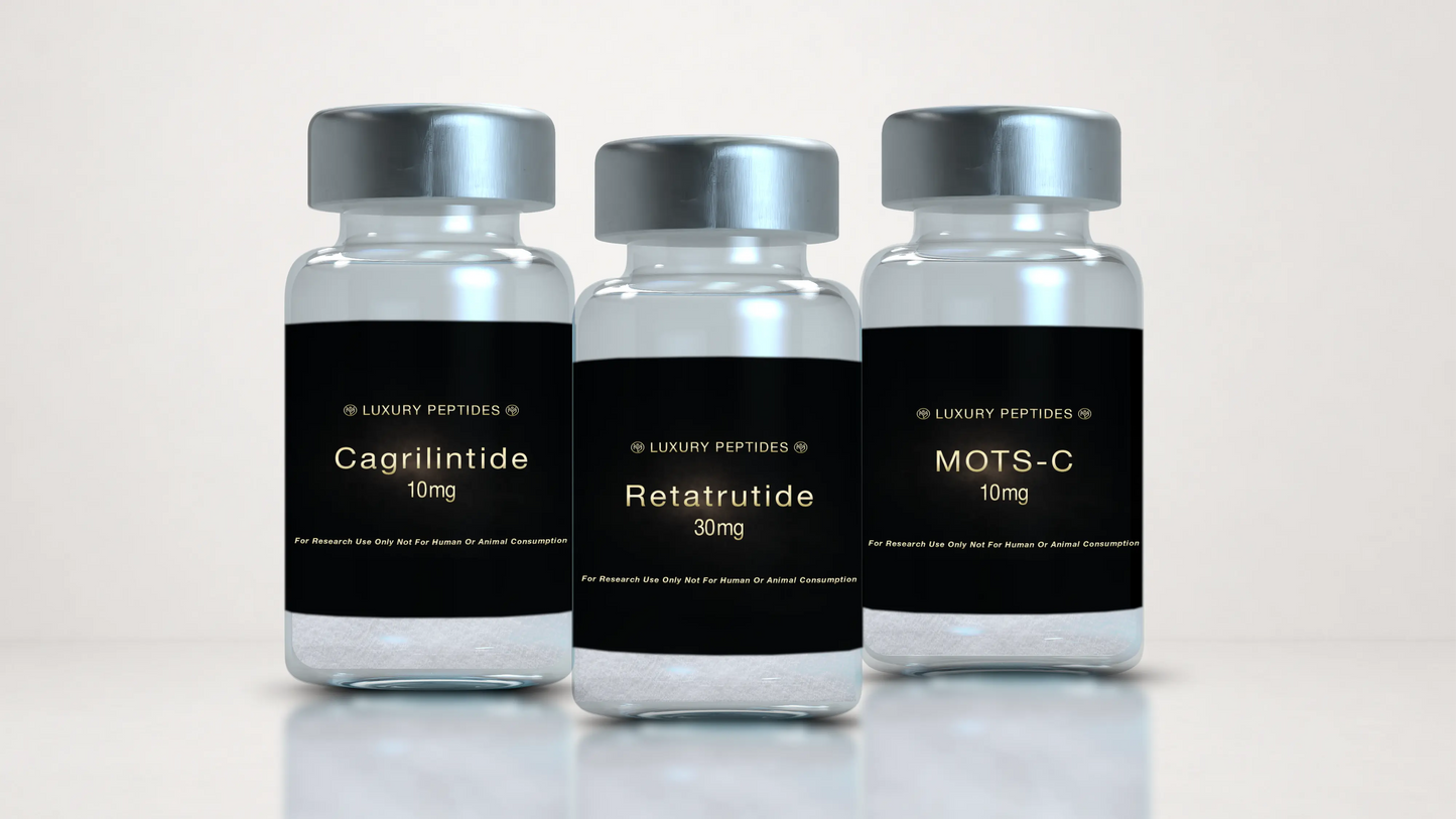 Three Luxury Peptides research vials labeled Cagrilintide 10mg, MOTS-C 10mg, and Retatrutide 30mg displayed on a neutral background with a soft reflective surface.