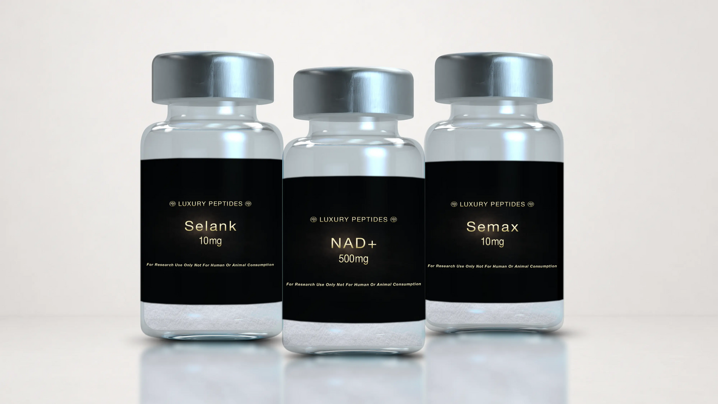 Three Luxury Peptides research vials labeled NAD+ 500mg, Selank 10mg, and Semax 10mg displayed on a neutral background with a soft reflective surface.